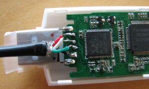 USB stick board after soldering cable to board, closeup